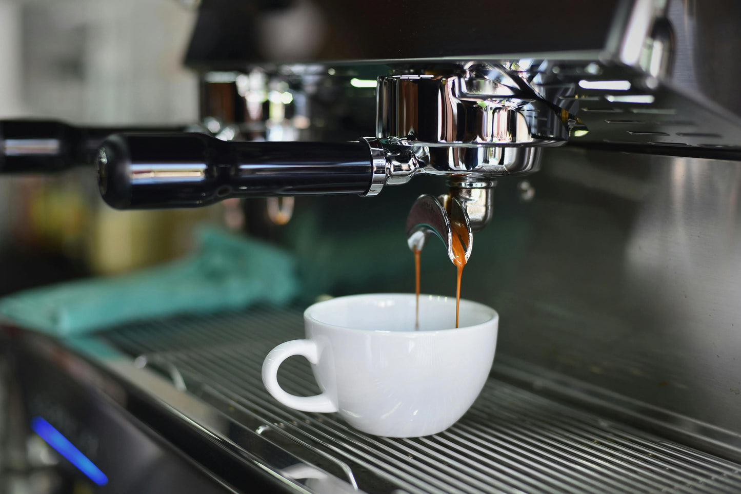 Espresso machine used with finely ground coffee for brewing
