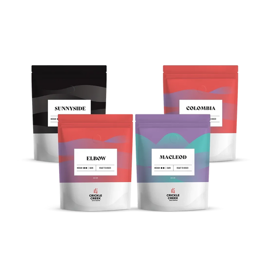A bundle of four specialty coffees crafted for espresso lovers, featuring MacLeod with notes of spice, blackberries, caramel, and dark chocolate; Espresso Blend with rich chocolate, caramel, and nutty undertones; Sumatra with dark chocolate, syrup, and warm spices; and Colombia with caramel, cocoa, and berry flavours. Perfect for creating balanced, bold espresso shots.